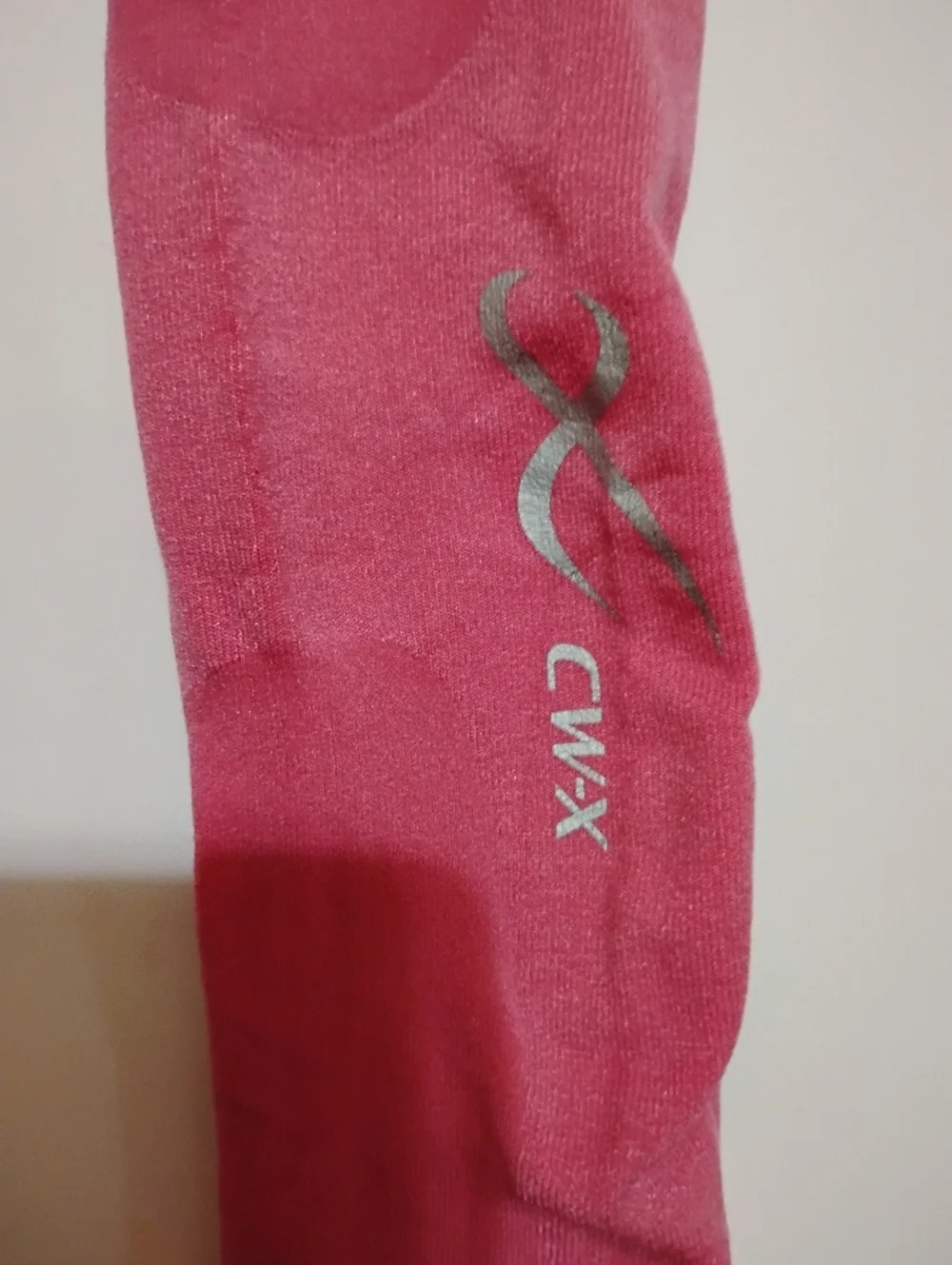 CW-X Hot Pink Compression Arm/Leg Sleeves